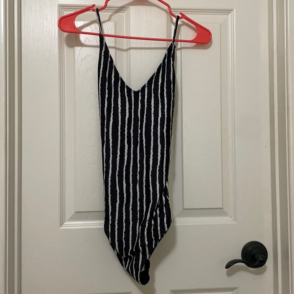 Black and white striped one piece swimsuit